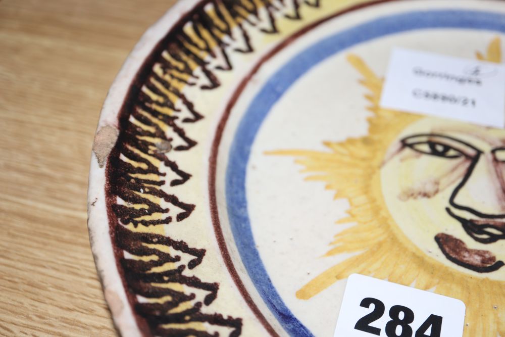 A collection of five 18th century Delft dishes, largest diameter 23cm